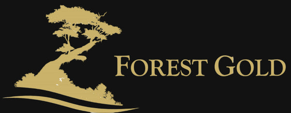 Forest Gold logo with black and gold tree silhouettes on a white background
